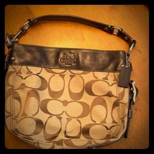 Brown and tan Coach bag